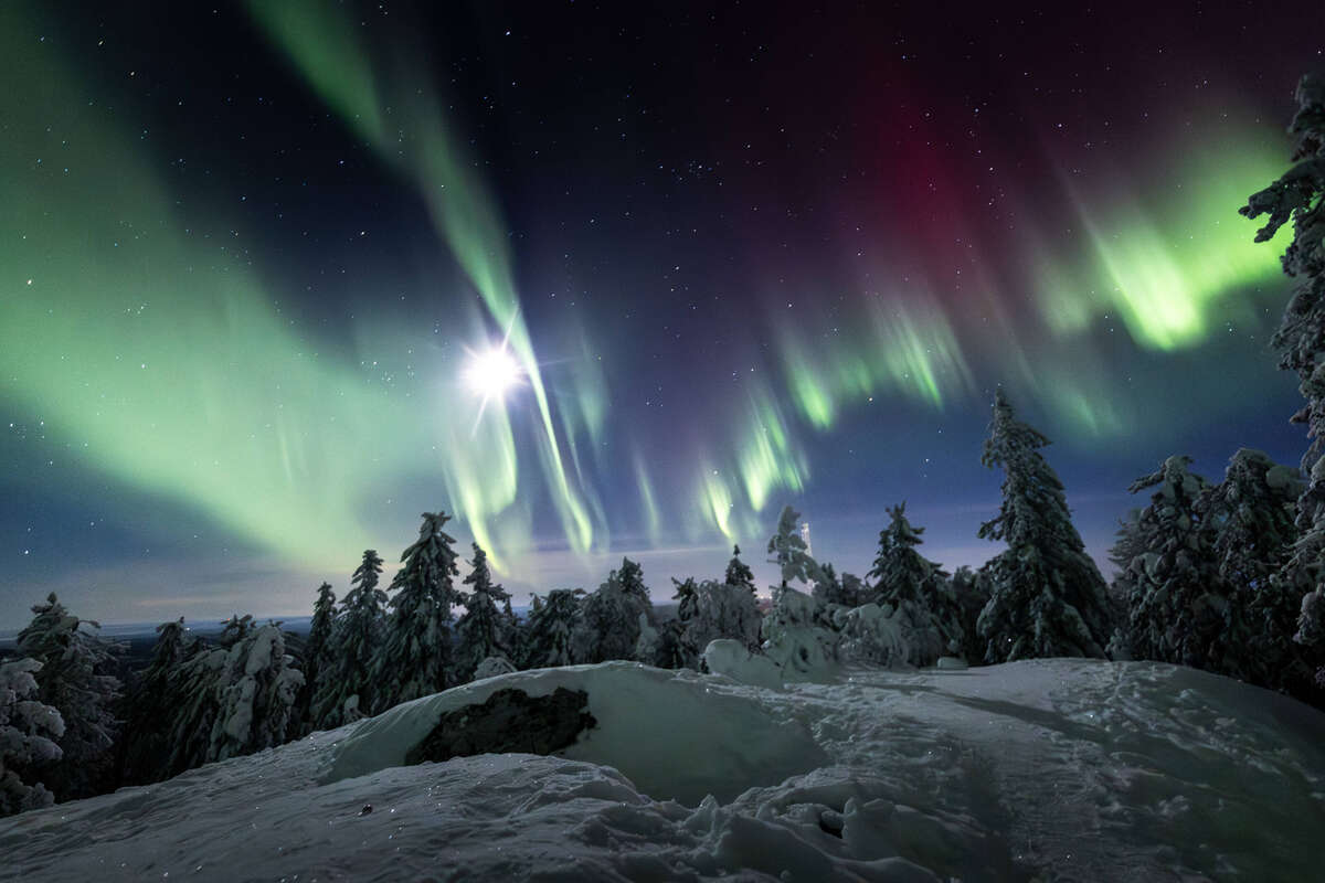 Pleine Lune et aurores boréales en Finlande